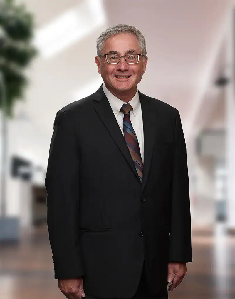John H. Wenker of Quinlivan & Hughes P.A.